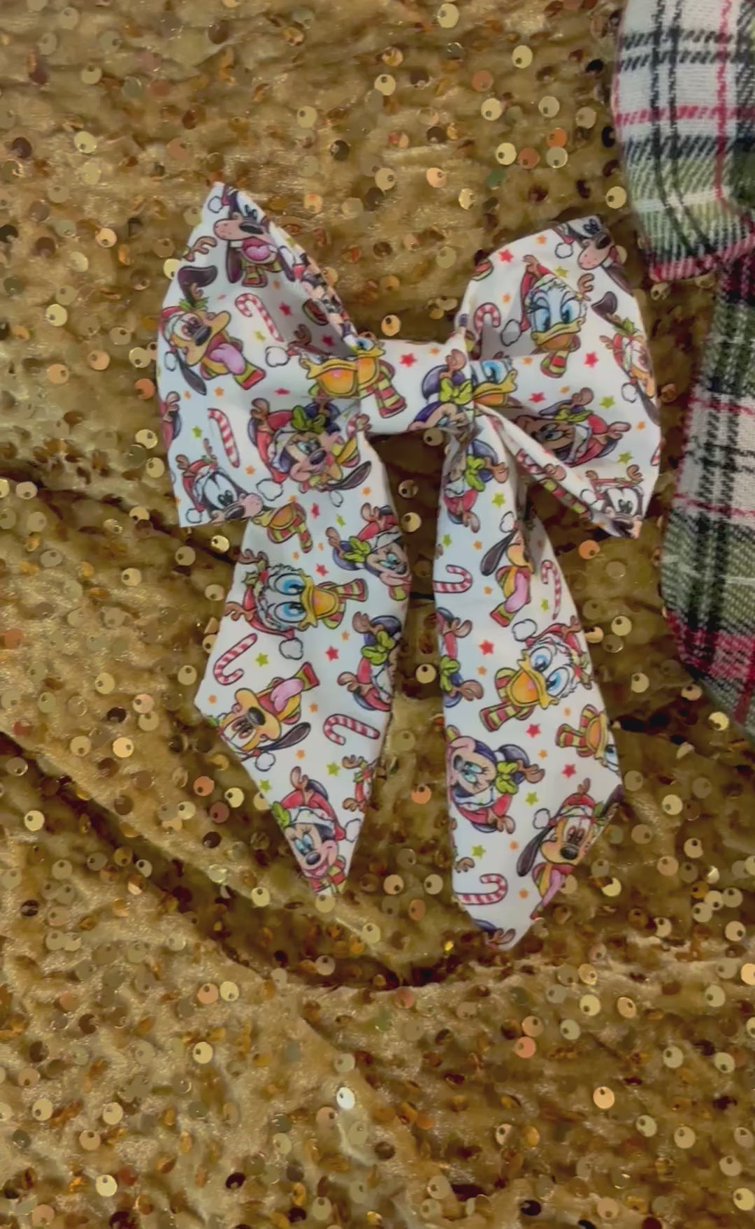 Three colorful hair bows in Christmas Pals, plaid and Snow Friends on a glittery gold background