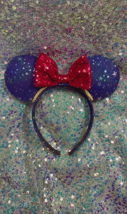 Handmade and ready to ship Sorcerer Sparkling Iridescent Mouse ears with fabric on both side of ears and the headband as well. The headband is universal sized and fits most. The set has a red sequin bow and gold trim. 