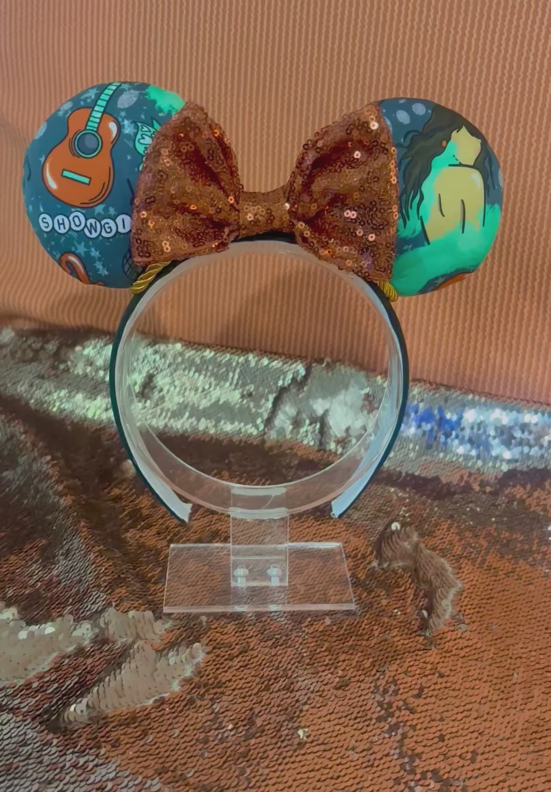 Handmade and ready to ship Actually Romantic Mouse ears with an orange sequin bow, orange twisted trim and on a black universal sized headband.