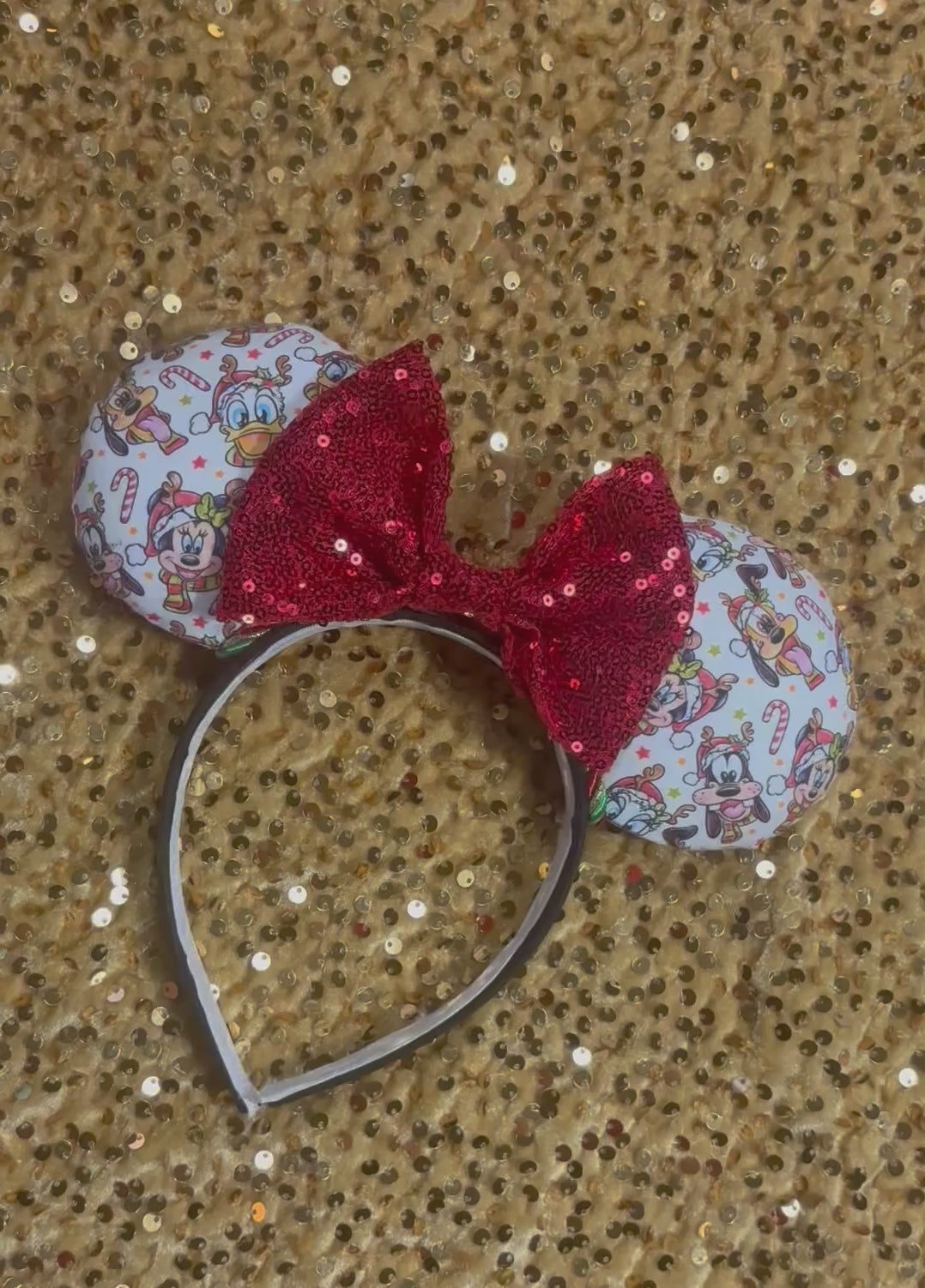 Handmade and ready to ship mouse ears. Mouse ears are on a universal sized poly cotton headband and set comes with a red sequin bow. Other colors are available if you leave a note.