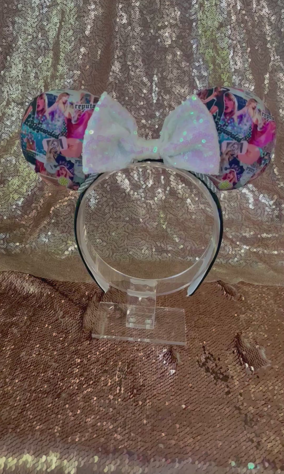 Handmade and ready to ship Bejeweled themed mouse ears with a white iridescent sequin bow. Images of TS are on fabric front and back on a universal sized poly cotton headband.