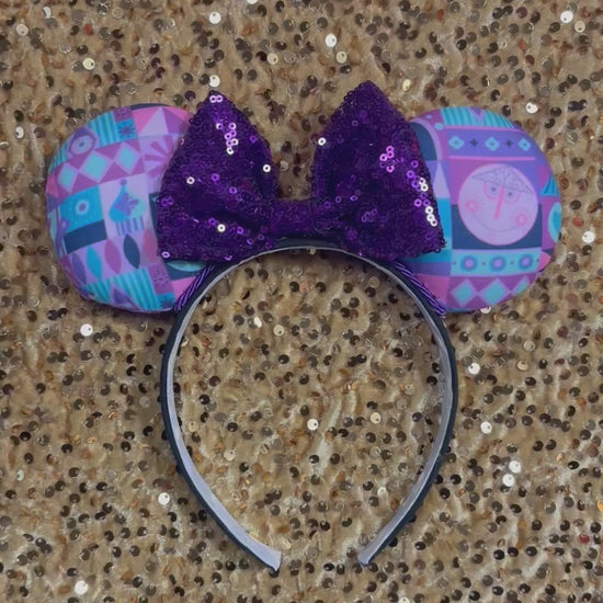small world purple and pink mouse ear headband with a purple sequin bow