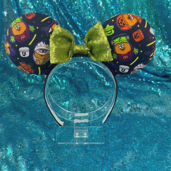 Handmade and ready to ship. The are some nostalgic chicken nuggets from the 90's in their Halloween costumes.  The Halloween pals are on these are well. Attached to a black headband with a lime green sequin bow. 
