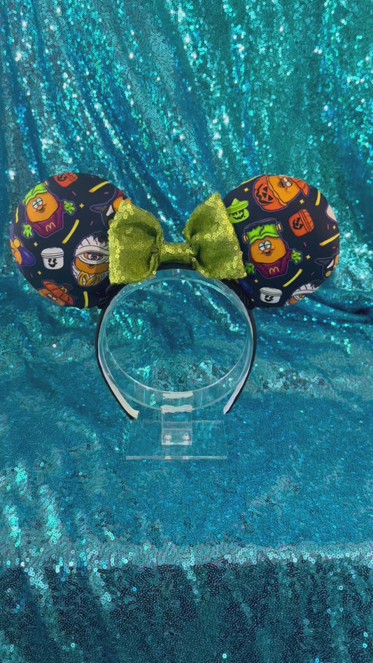 Handmade and ready to ship. The are some nostalgic chicken nuggets from the 90's in their Halloween costumes.  The Halloween pals are on these are well. Attached to a black headband with a lime green sequin bow. 