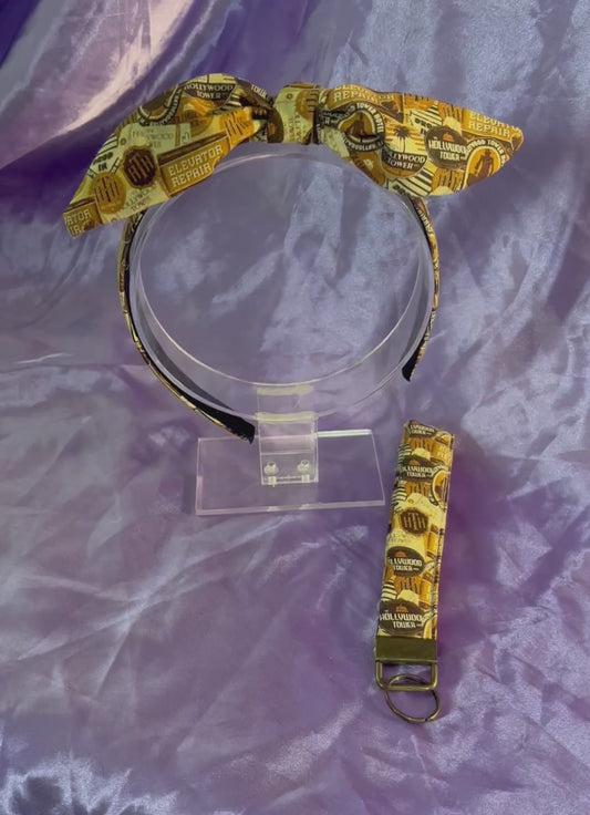 Handmade and ready to ship with free shipping. Tower of terror inspired twisted bow headband and keychain wristlet. Headband is universal sized and fits most. The bow can be slid to any side of the headband you prefer. 