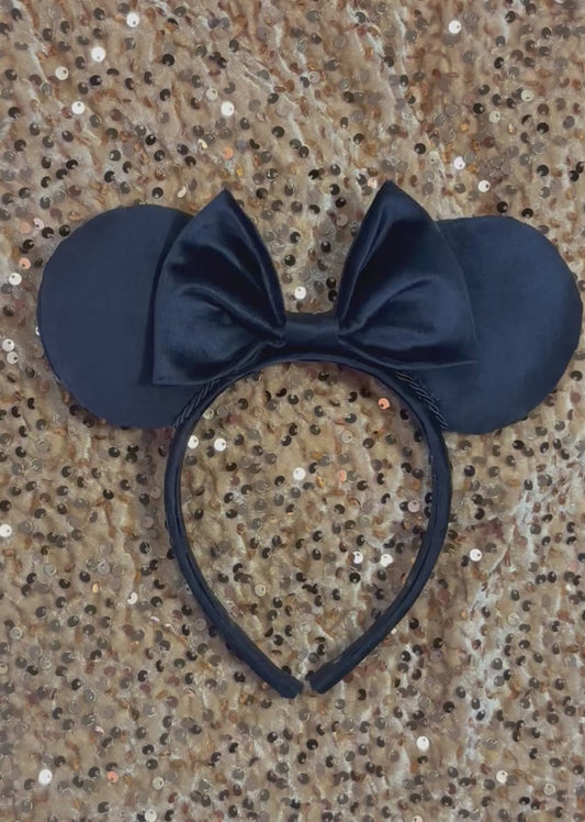 Handmade and ready to ship Black Velvet Mouse ears with the fabric on the ears, front and back, the headband and the bow. The headband is a universal sized headband.
