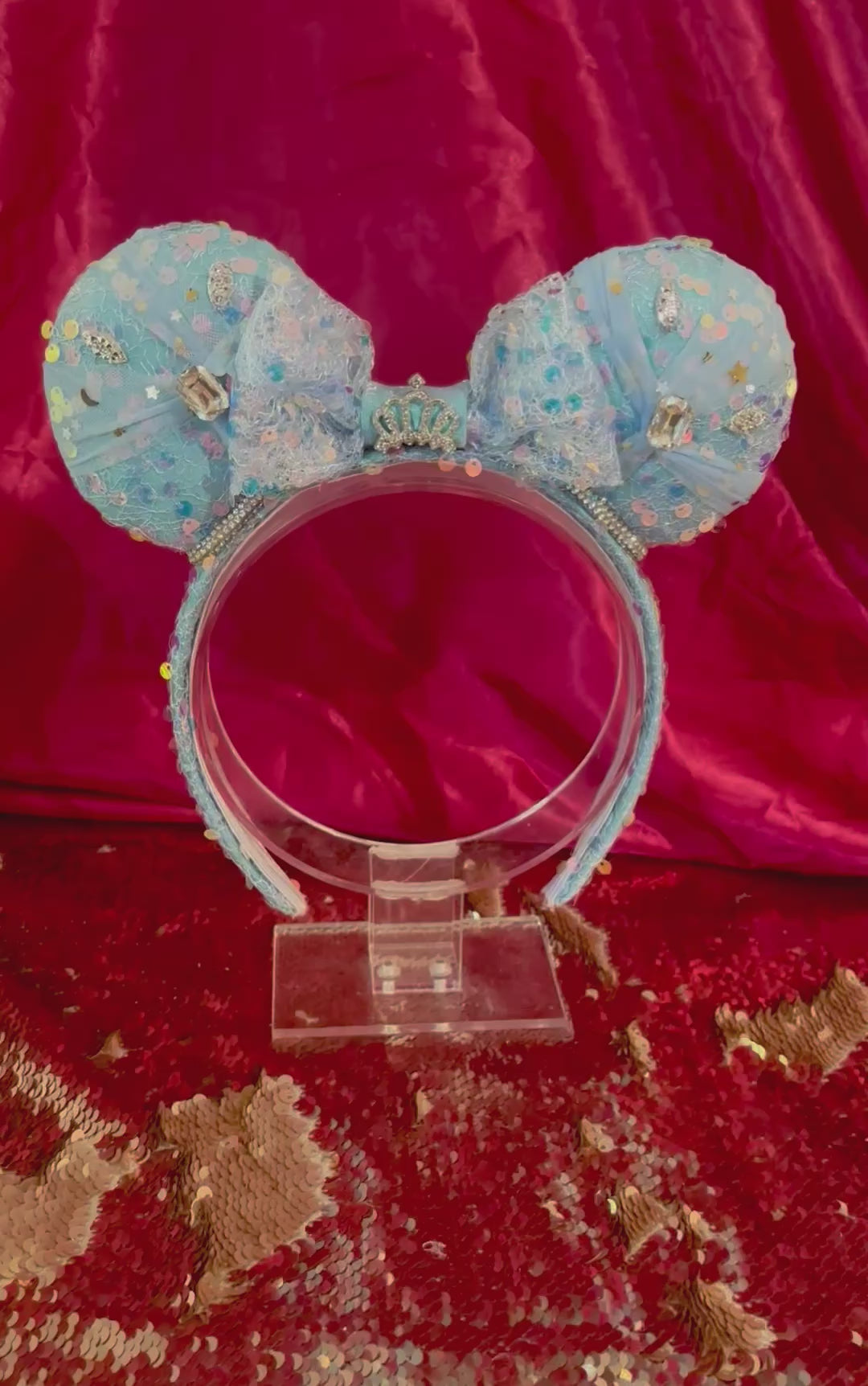 Handmade and ready to ship blue sequin mouse ears headband inspired by Cinderella with tulle and silver gemstones with a crown charm middle and rhinestone trim along inner ears.